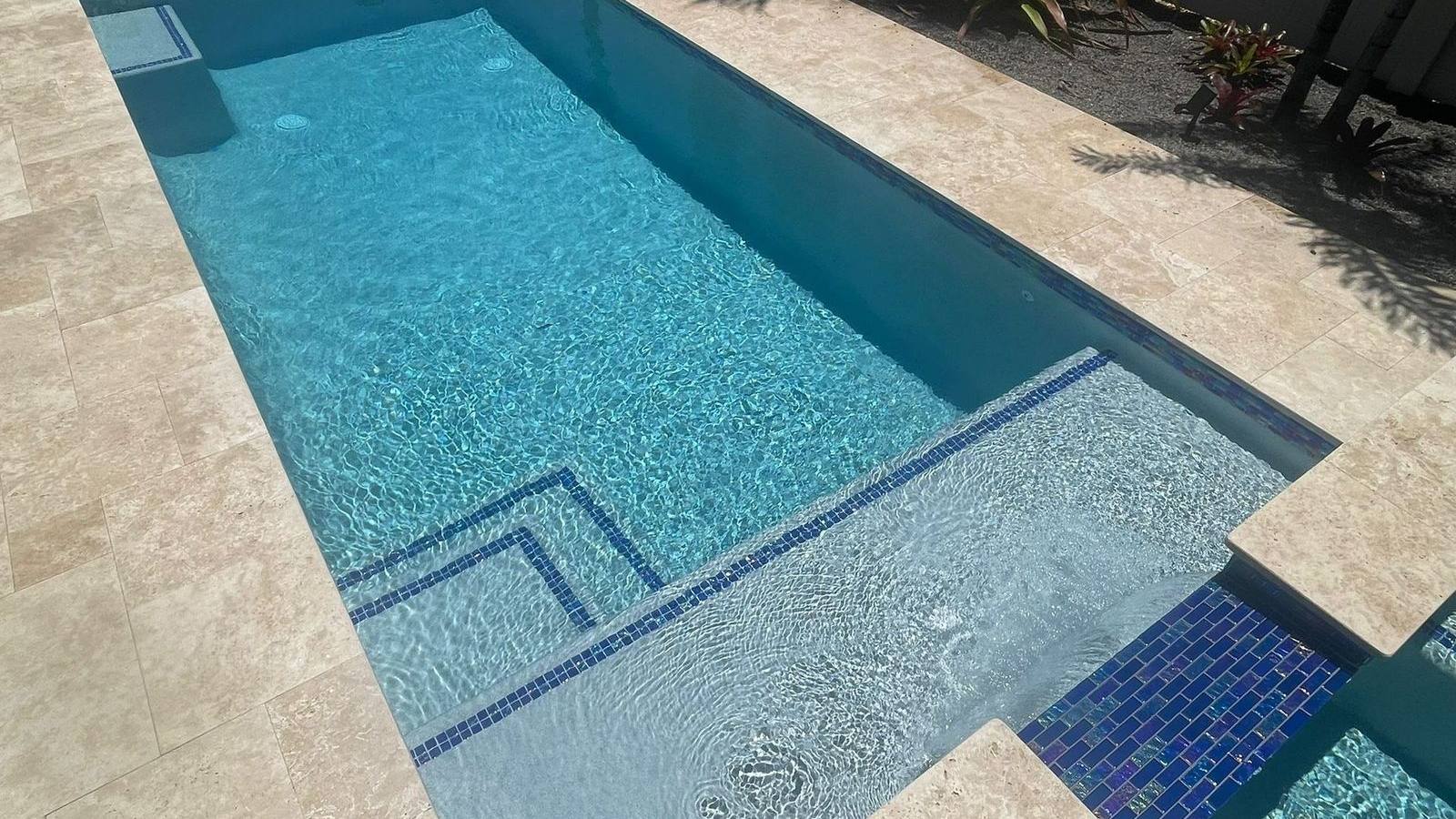 Custom pool and patio project by Cliff's Pools & Patios for Lake Worth, FL homeowners