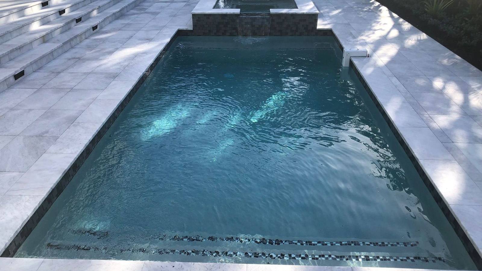 Custom pool and patio project by Cliff's Pools & Patios for Boca Raton, FL homeowners