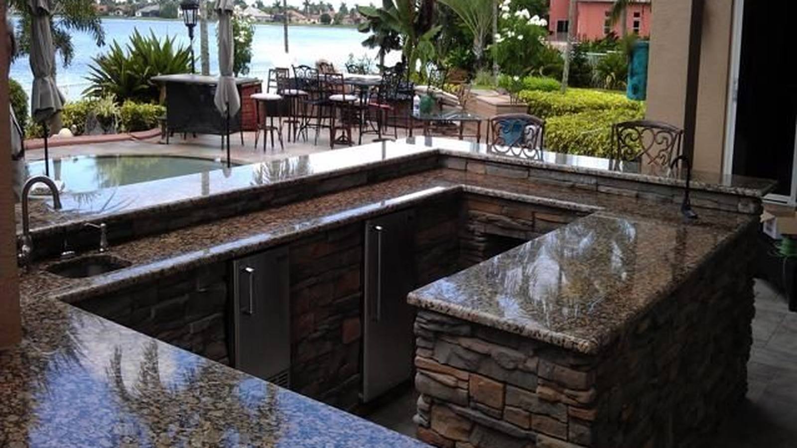 Custom pool and patio project by Cliff's Pools & Patios for Palm Beach Gardens, FL homeowners