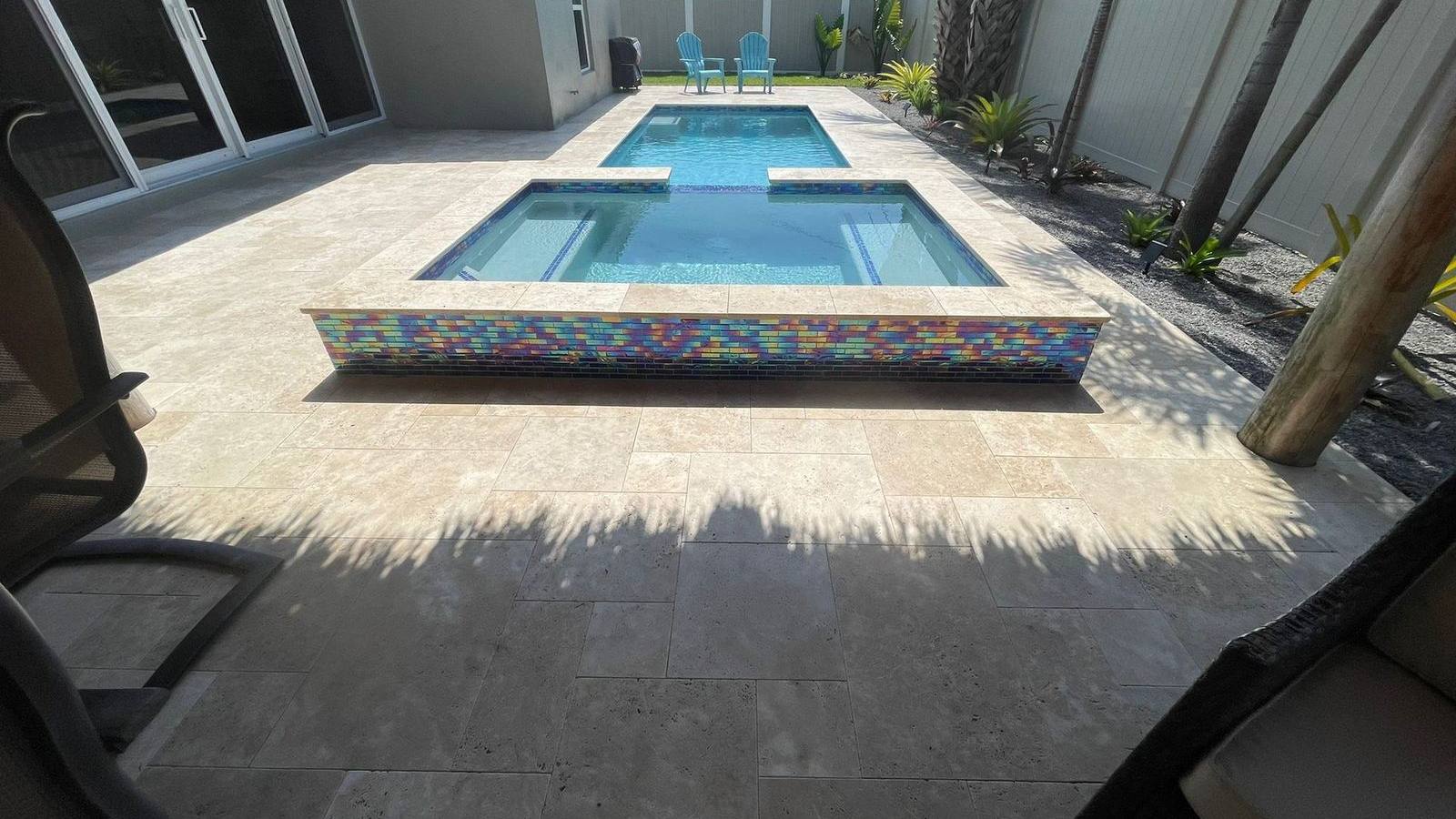 Custom pool and patio project by Cliff's Pools & Patios for Wellington, FL homeowners