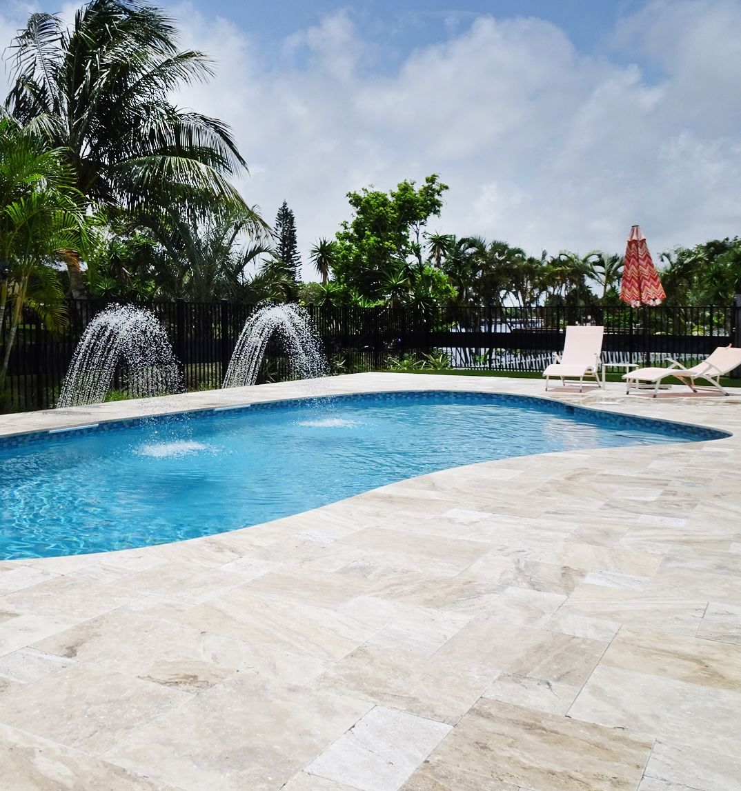 Cliff's elegant classic pool in a tropical setting