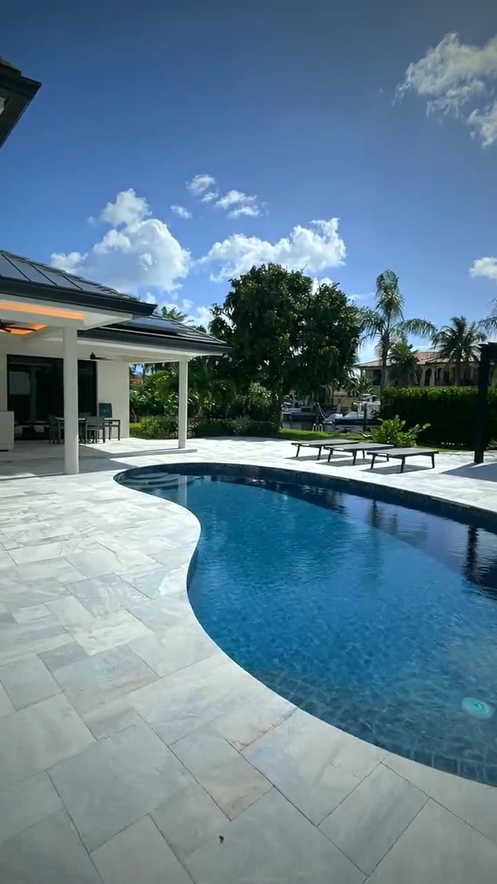 Award-winning custom pool and patio by Cliff's Pools & Patios