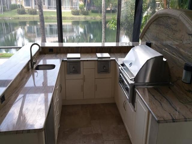Cliff's Pools & Patios modern outdoor kitchen with pool view - serving Glen Ridge, FL