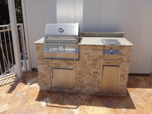 Cliff's Pools & Patios screened outdoor kitchen with stainless grill - serving Tamarac, FL