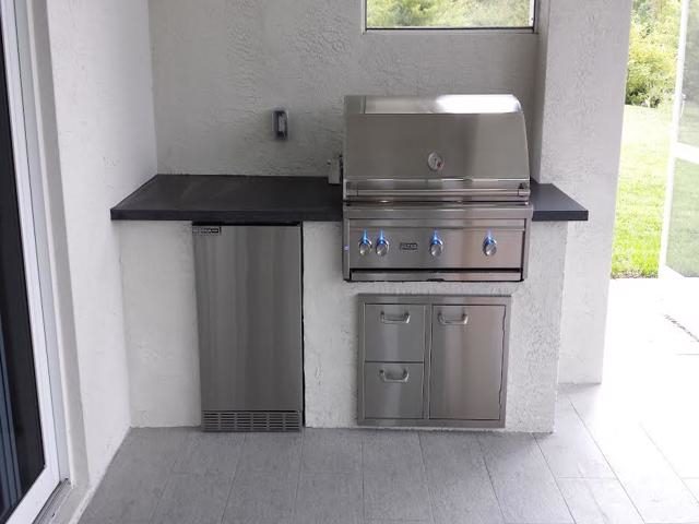 Cliff's Pools & Patios covered modern outdoor kitchen with stainless - serving Miramar, FL