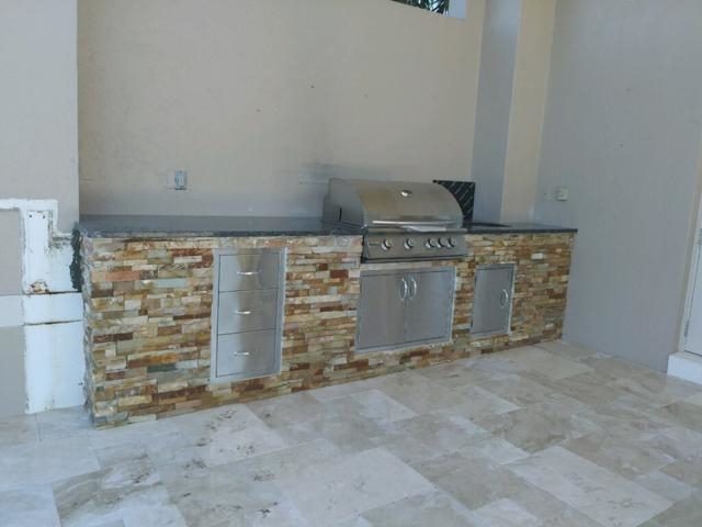 Cliff's Pools & Patios clean modern outdoor kitchen build - serving Southwest Ranches, FL