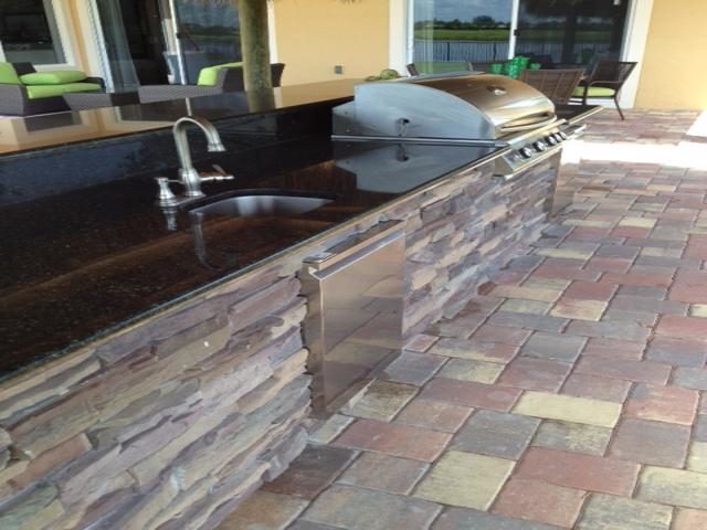 Cliff's Pools & Patios long dark granite outdoor kitchen bar - serving Highland Beach, FL