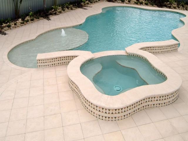 Cliff's Pools & Patios paver pool deck and patio