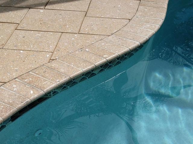 Cliff's Pools & Patios paver pool deck and patio