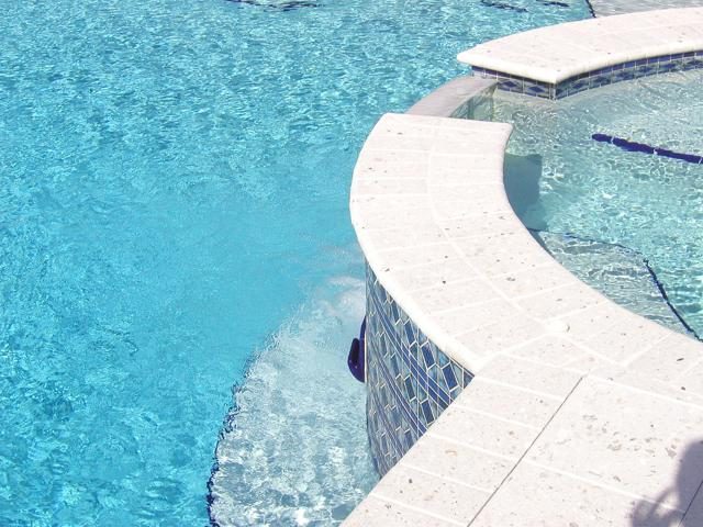 Cliff's Pools & Patios paver pool deck and patio