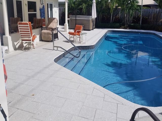 Cliff's Pools & Patios paver pool deck and patio