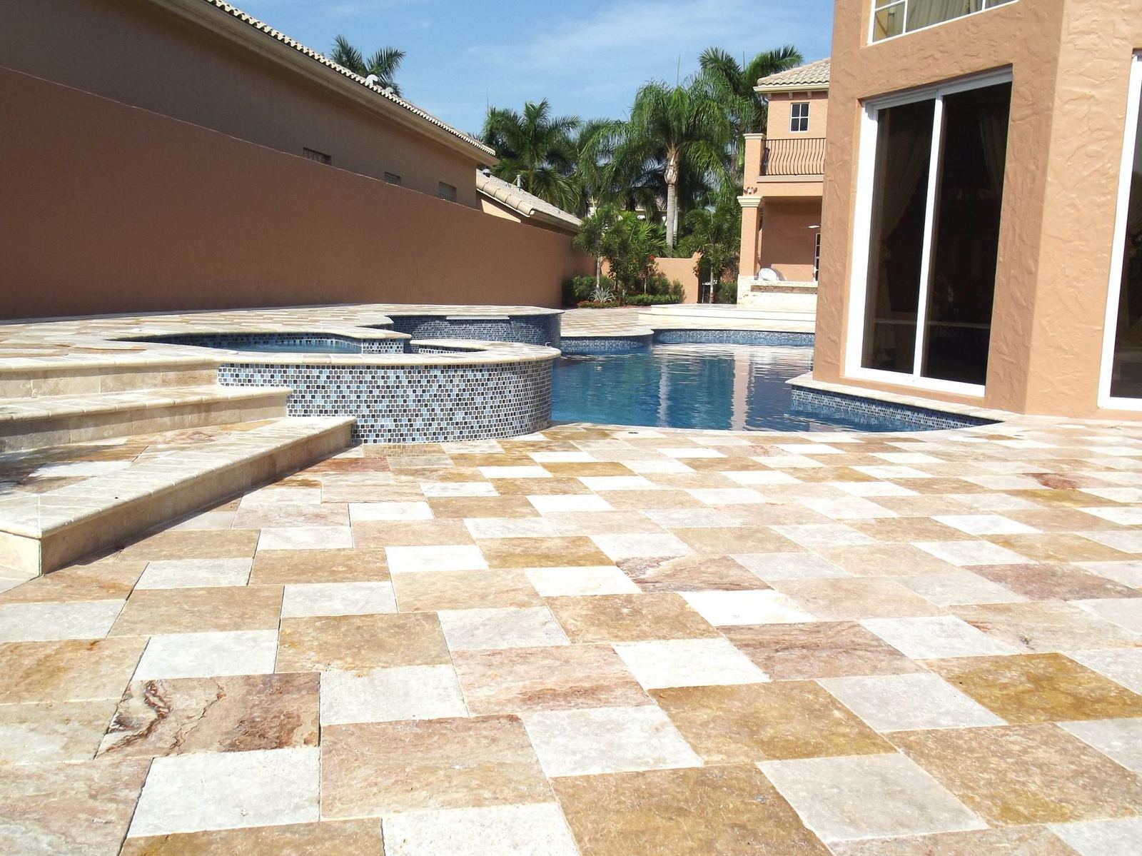 Cliff's Pools & Patios paver pool deck and patio