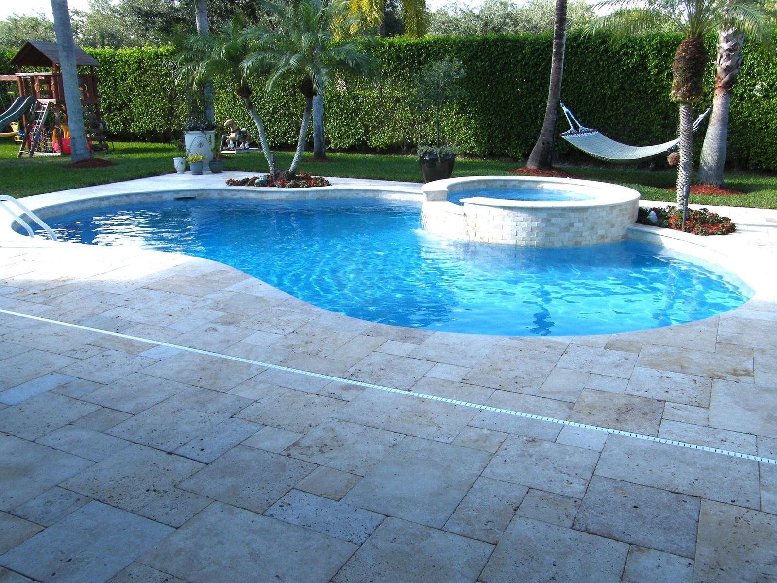 Cliff's Pools & Patios paver pool deck and patio
