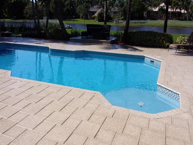 Cliff's Pools & Patios paver pool deck and patio