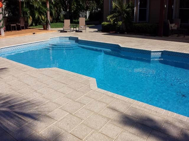 Cliff's Pools & Patios paver pool deck and patio
