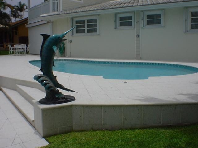 Cliff's Pools & Patios paver pool deck and patio