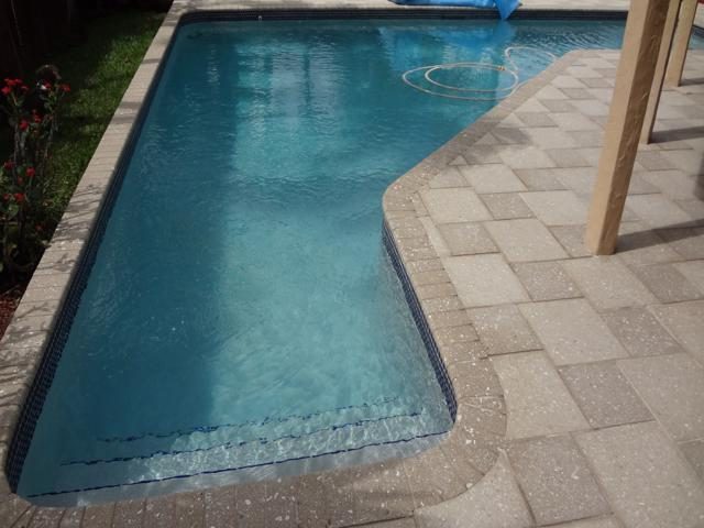 Cliff's Pools & Patios paver pool deck and patio