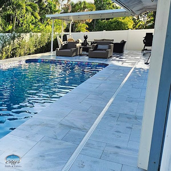 Cliff's Pools & Patios pool with covered pergola lounge